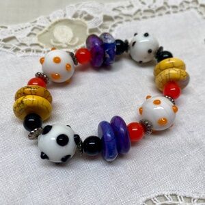 Multi Colored Festive Glass Beaded Stretch Bracelet With Silver Bead Spacers